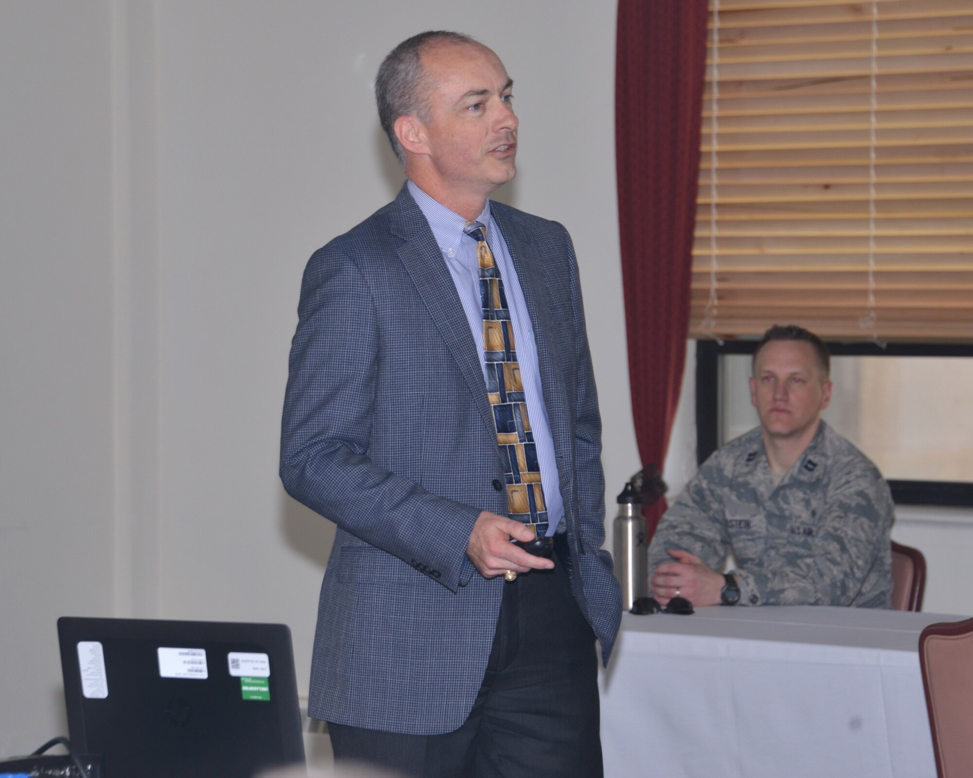 Dean Craig White, the dean of the University of New Mexico Anderson School of Management, shared information about the school with a group of Kirtland Air Force Base Airmen and civilians May 6 at the Mountain View Club. (Photo by Dennis Carlson)