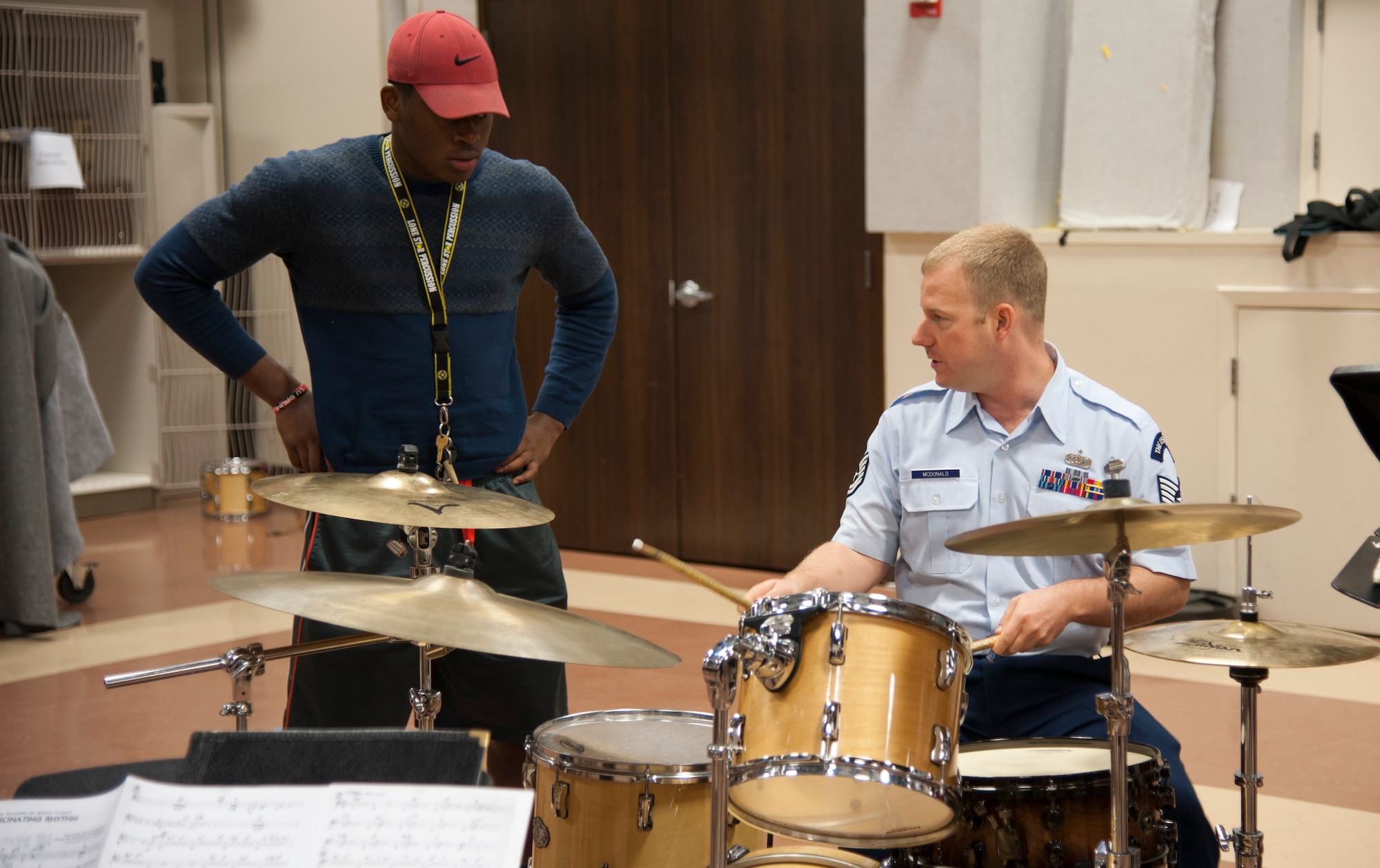 Tech. Sgt. David McDonald, the drummer for the Airmen of Note, the Air Force’s premiere jazz ensemble, teaches a drummer for the Lamar University Jazz Band, some new techniques during an Advancing Innovation through Music Outreach at Lamar University, Beaumont, Texas, April 25. (U.S. Air Force photo by Tech. Sgt. James Bolinger)