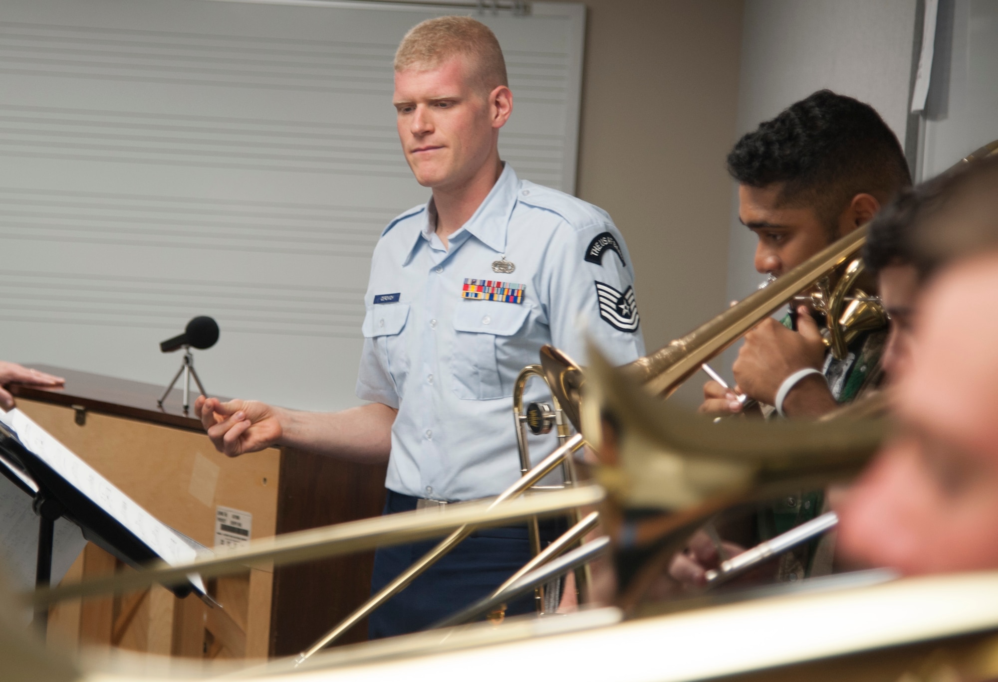 Trombone students from the Lamar University Jazz Band perform under the watchful eye of Tech. Sgt. Kevin Cerovich, a trombone player for The Airmen of Note, the Air Force’s premiere jazz ensemble, during an Advancing Innovation through Music Outreach April 25 at Lamar University in Beaumont, Texas. (U.S. Air Force photo by Tech. Sgt. James Bolinger)