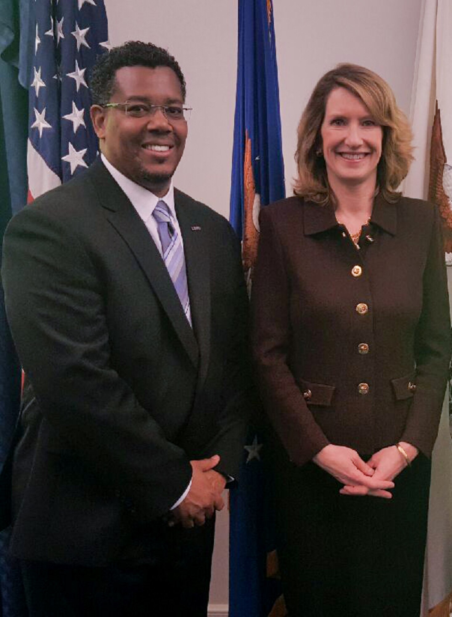 Lisa S. Disbrow, under secretary of the Air Force, joins Troy D. Armstead following the Department of Defense Spirit of Service Award ceremonies  held May 4, 2016, at the Pentagon. Armstead, a safety and occupational health manager for Air Force Safety, Headquarters, U.S. Air Force, was one of eight Air Force civilians recognized for his commitment to community service. (U.S. Air Force photo)