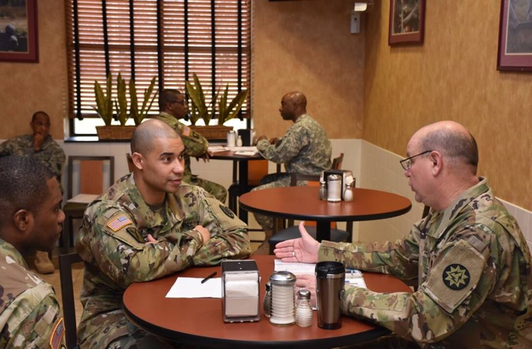Senior warrant officers mentor junior warrant and noncommissioned officers during a mock promotion board at Fort Eustis, Va., Jan. 28, 2016. The mock promotion board is held by the Warrant Officer Association Hampton Roads Chapter to prepare current and future warrant officers for career progression. (Courtesy photo)