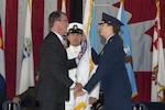 U.S. Air Force Gen. Lori J. Robinson receives the U.S. Northern Command guidon from the U.S. Secretary of Defense, Ashton B. Carter signifying her acceptance of command, May 13, 2016, Peterson Air Force Base, Colo. Gen. Robinson is the seventh commander of USNORTHCOM since its inception on Oct 1, 2002. 