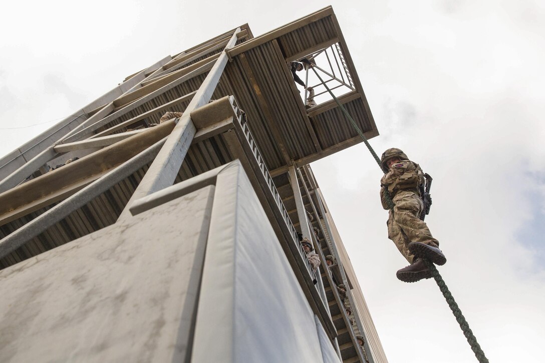 British Marine Capt. Luke Wadman descends on a rope at  at Camp Pendleton, Calif., May 9, 2016. U.S. Marines and British Marine Commandos train together to improve interoperability. Marine Corps photo by Cpl. Jonathan Boynes