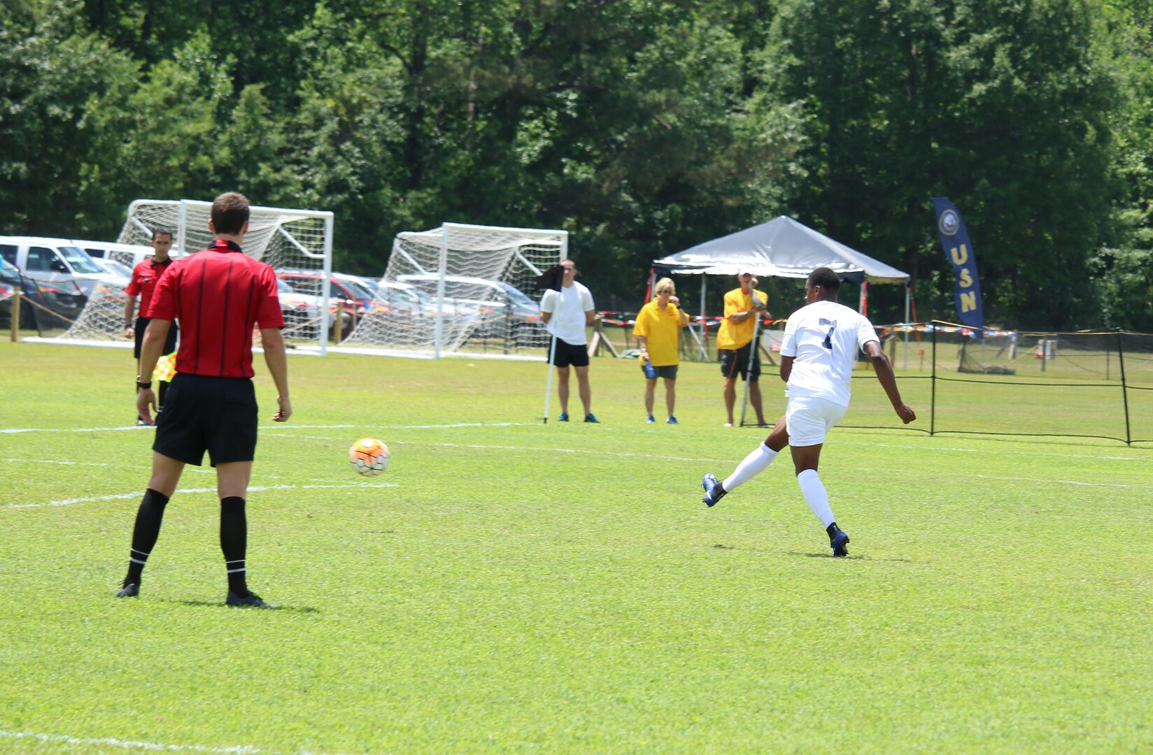 Fort Benning, Ga. - Navy PO2 Kyle Baker scores a late goal on a penalty kick in the 89th minute of the championship match of the 2016 Armed Forces Men's Soccer Championship hosted at Fort Benning, Ga from 6-14 May 2016.  Air Force would win the Championship 3-2, with Navy taking silver.