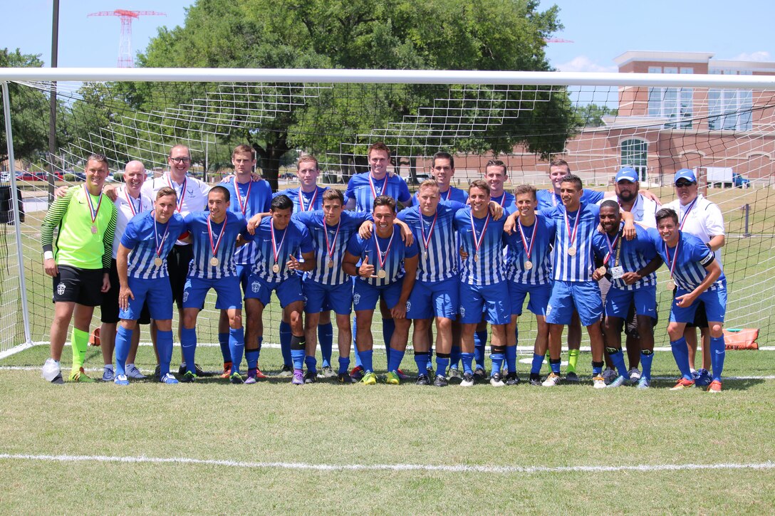 Fort Benning, Ga. - Air Force presents their gold medals after winning the championship match of the 2016 Armed Forces Men's Soccer Championship hosted at Fort Benning, Ga from 6-14 May 2016.  Air Force would win the Championship 3-2, with Navy taking silver.