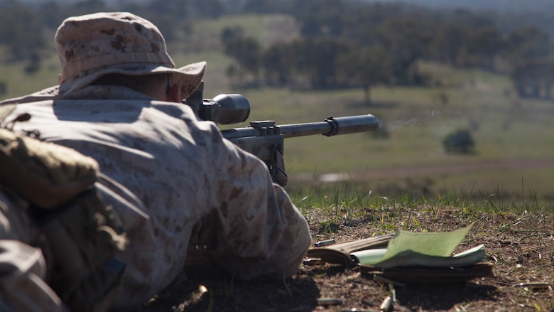 Cpl. John Luze, a competitor with the Marine Corps Shooting Team, fires a round with his M40A5 sniper rifle during a practice fire at Puckpunyal Military Area in Victoria, Australia, May 7, 2016. The Marine Corps Shooting Team traveled to Australia to compete in the Australian Army Skill at Arms Meeting 2016. The M40A5 is a bolt-action sniper rifle the Marine Corps uses for long-range enemy engagements.