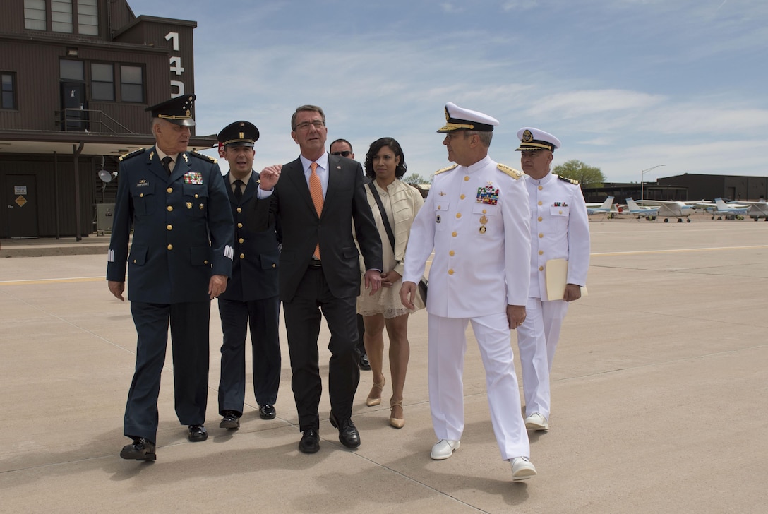 Defense Secretary Ash Carter walks with Mexican Defense Secretary Gen. Salvador Cienfuegos Zepeda and Adm. Vidal Francisco Soberon Sanz, Mexico’s navy secretary, after the change-of-command ceremony for the North American Aerospace Defense Command and U.S. Northern Command at Peterson Air Force Base, Colo., May 13, 2016. DoD photo by Air Force Senior Master Sgt. Adrian Cadiz