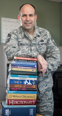A book written by Air Force Reserve Chief Master Sgt. Matt Proietti, a longtime military public affairs professional, is included in the 2016 Air Force Chief of Staff Reading List. At All Costs is a biography of the late Chief Master Sgt. Richard L. Etchberger, who posthumously received the Medal of Honor in 2010, 42 years after his death during a battle at a secret U.S. radar camp in Laos.  (U.S. Air Force photo by Staff Sgt. Brenda Davis)