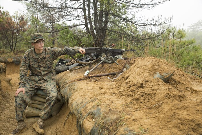 Lance Cpl. Matthew Betkoski, a refrigeration and air conditioning technician with Marine Wing Support Squadron 171, mans a M240 bravo light-machine during exercise Thunder Horse 16.2 at the Japan Ground Self-Defense Force’s Haramura Maneuver Area in Hiroshima, Japan, May 10, 2016. The squadron conducts exercises such as this several times a year in order to train all the Marines within the squadron, enhance their technical skills, field experience and military occupational specialty capability. (U.S. Marine Corps photo by Lance Cpl. Aaron Henson/Released)