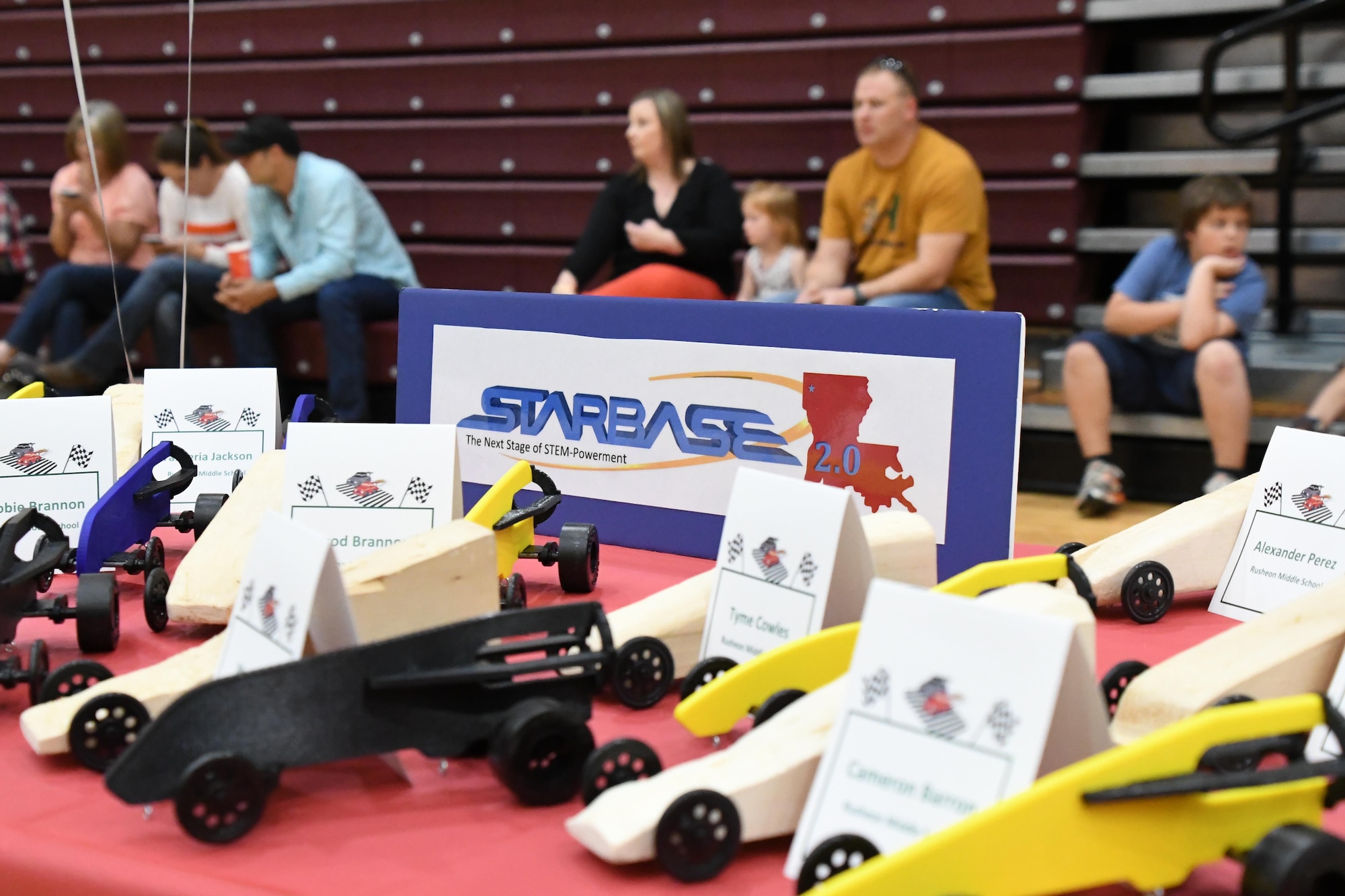 Families of local middle school students wait for the STARBASE 2.0 End of Year Celebration to begin at Bossier Parish Community College in Bossier City, La., May 9, 2016. Students from three local middle schools were awarded with participation certificates and project awards. The carbon dioxide powered and pine wood race cars were made during the after school program that promotes continued education in science, technology, engineering and math. (U.S. Air Force photo by Master Sgt. Dachelle Melville/Released)