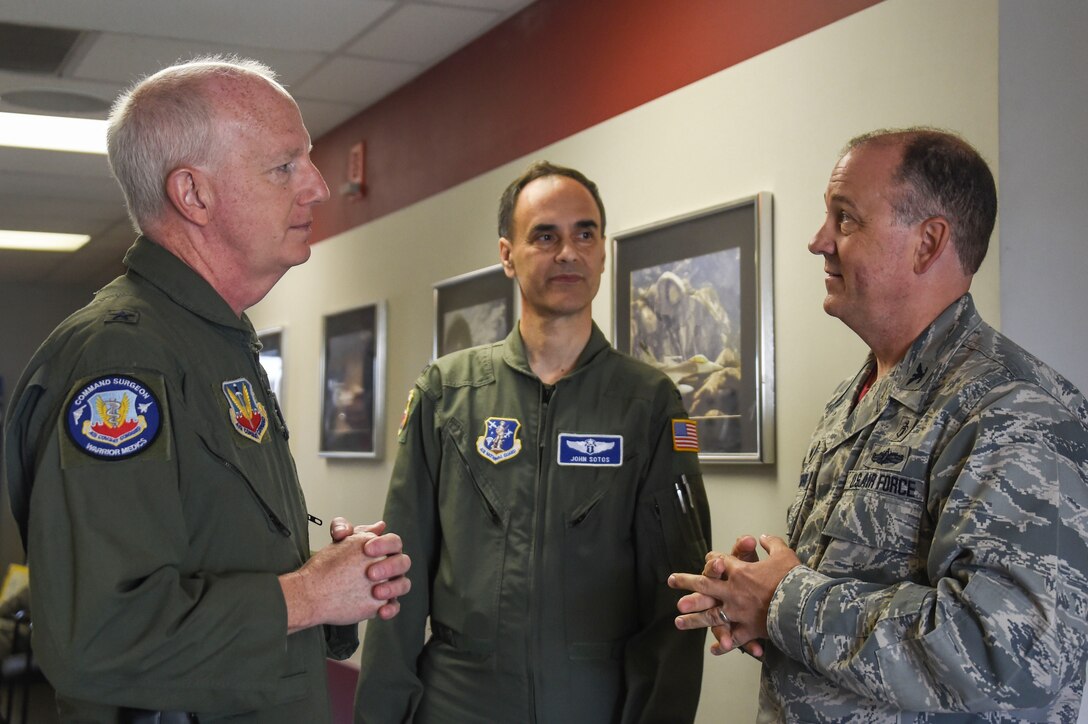 U.S. Air Force Brig. Gen. Christopher Knapp, the Air National Guard Assistant to the Command Surgeon, Air Combat Command (left), speaks with Col. John Sotos, California ANG State Air Surgeon (center), and Col. John Blackburn, 144th Medical Group commander, at the Fresno Air National Guard Base May 14, 2016. Blackburn showed Knapp and Sotos around the 144th MDG facility and spoke to them about the 144th MDG mission. (U.S. Air National Guard photo by Senior Airman Klynne Pearl Serrano)