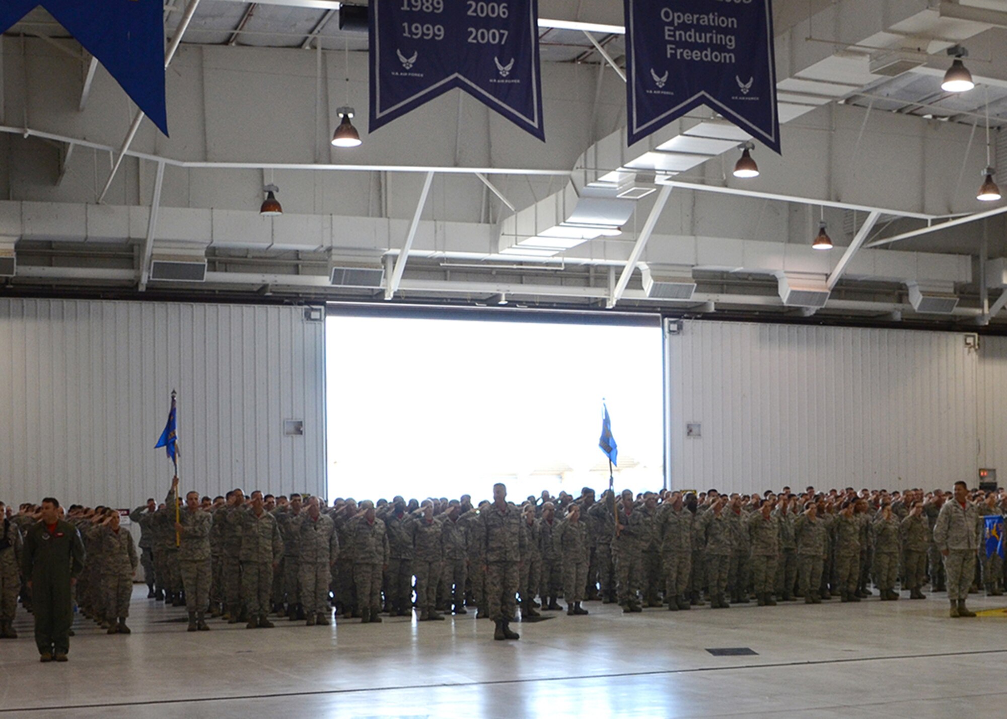 Members of the 131st Bomb Wing salute their new commander, Col. Ken “Willie B” Eaves, at the 131st Bomb Wing change of command ceremony at Whiteman Air Force Base, Mo., May 15, 2016. Eaves is now responsible for the Air National Guard’s only B-2 unit, which provides nearly 1,100 combat-ready Citizen-Airmen for both state and federal missions. (U.S. Air National Guard photo by Staff Sgt. Brittany Cannon)



