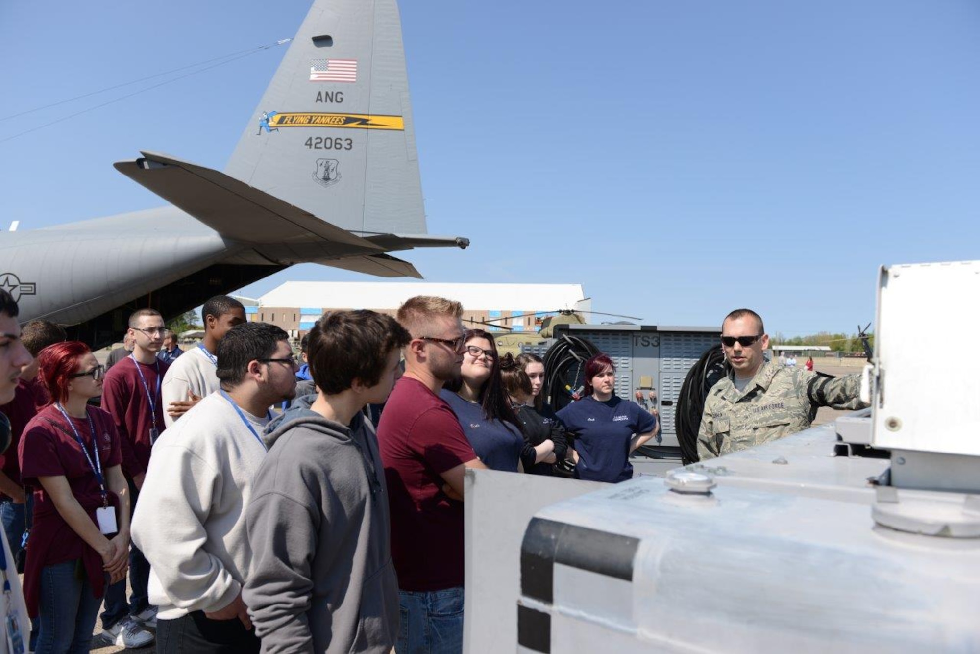 Master Sgt. Dennis Coughlin, aircraft ground equipment technician, explains the function and purpose of equipment to support flight mobility May 12, 2016, during a Career Day hosted at Bradley Air National Guard Base, East Granby, Conn. Students discussed military careers with Air National Guardsmen during their visit to the 103rd Airlift Wing. (U.S. Air Force photo by Master Sgt. Erin McNamara)