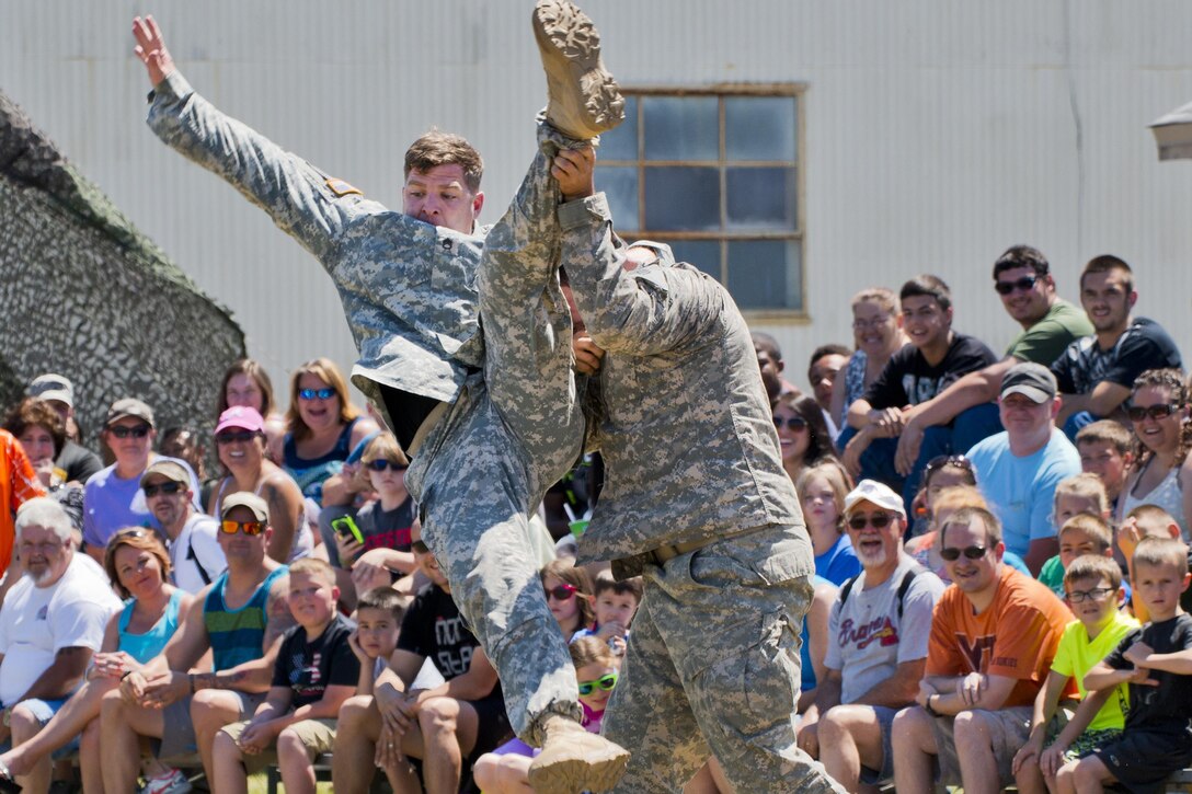 Soldiers demonstrate hand-to-hand combat during the 6th Ranger Training Battalion’s open house at Eglin Air Force Base, Fla., May 7, 2016. During the event, members of the public could view equipment and learn how Rangers train. Air Force photo by Samuel King Jr.