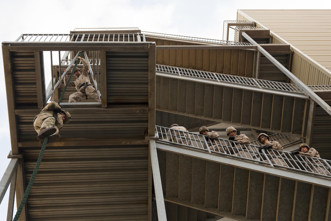 U.S. and British Marines practice fast-roping techniques at Camp Pendleton, Calif., May 9, 2016. The 1st Air Naval Gunfire Liaison Company, 1st Marine Expeditionary Force facilitated the training, which included helicopter rope-suspension techniques. Marine Corps photo by Cpl. Jonathan Boynes