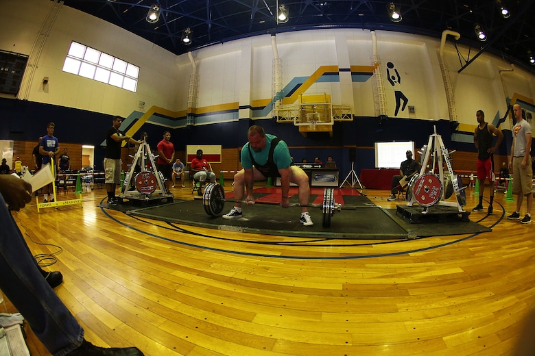 Andy Stephens, a Status of Forces Agreement member, prepares to deadlift during the 2016 Deadlift Competition at the IronWorks Gymnasium at Marine Corps Air Station Iwakuni, Japan, May 14, 2016. SOFA members and Japanese off-base residents competed in their respective weight class for the ultimate deadlift title. This competition gave participants a chance to showcase their physical strength, dedication to fitness, drive to win, and gave more incentive for service members to push their physical capabilities in a positive, competitive atmosphere. (U.S. Marine Corps photo by Sgt. Jessica Quezada/Released)