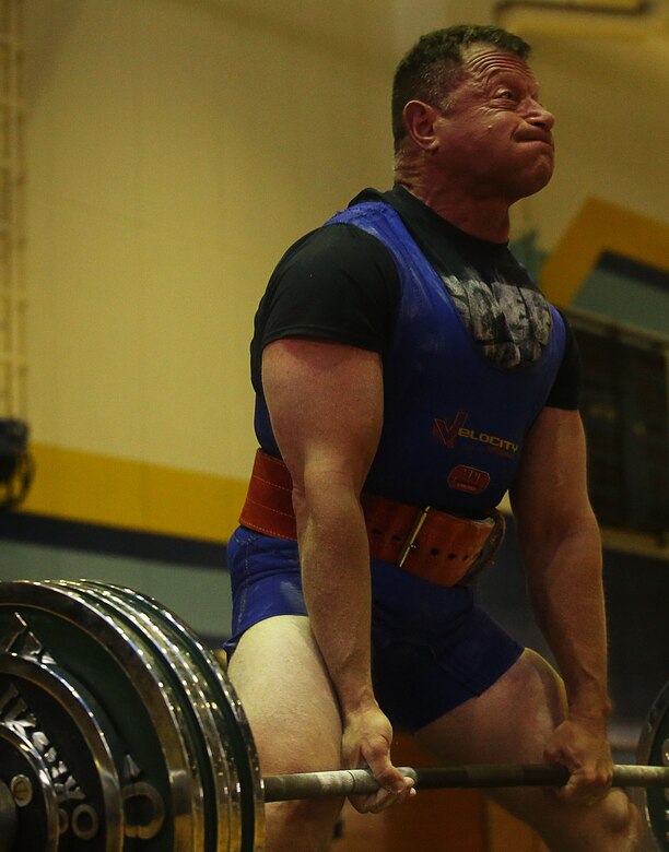 Abe Roman, assistant air traffic control facility officer with Headquarters & Headquarters Squadron, deadlifts during the 2016 Deadlift Competition at the IronWorks Gymnasium at Marine Corps Air Station Iwakuni, Japan, May 14, 2016. Status of Forces Agreement members and Japanese off-base residents competed in their respective weight class for the ultimate deadlift title. This competition gave participants a chance to showcase their physical strength, dedication to fitness, drive to win, and gave more incentive for service members to push their physical capabilities in a positive, competitive atmosphere. (U.S. Marine Corps photo by Sgt. Jessica Quezada/Released)