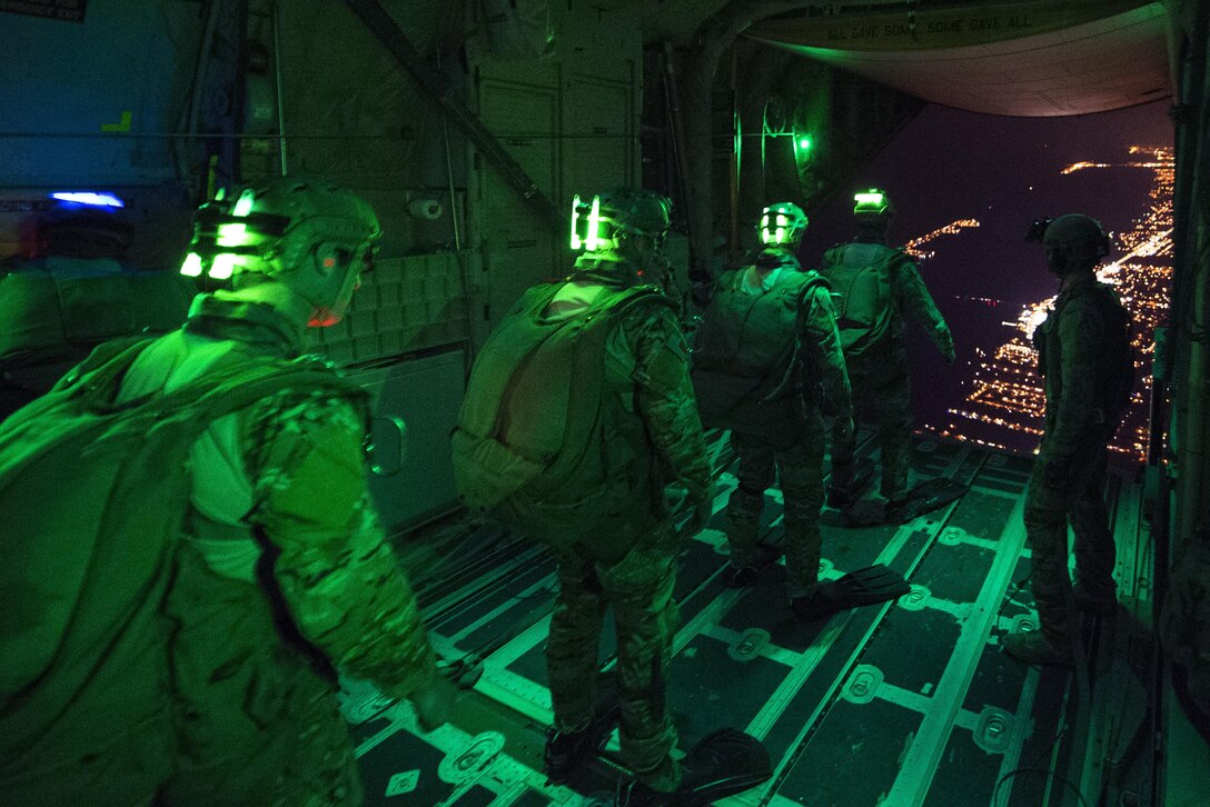 Airmen line up before jumping out of an MC-130J Commando II aircraft during Emerald Warrior 16 at Hurlburt Field, Fla., May 4, 2016. Air Force photo by Staff Sgt. Paul Labbe
