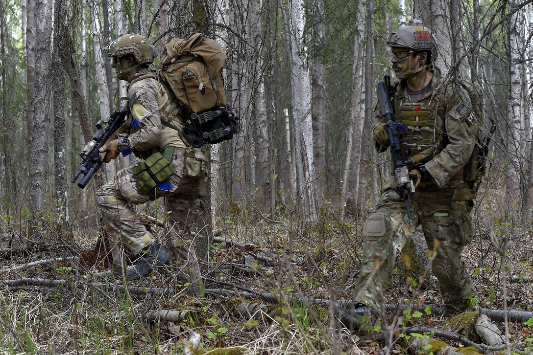 Pararescuemen move toward a rescue site during mass casualty search and rescue training at Joint Base Elmendorf-Richardson, Alaska, May 4, 2016. The pararescuemen are assigned to the Alaska Air National Guard’s 212th Rescue Squadron. Air Force photo by Alejandro Pena 