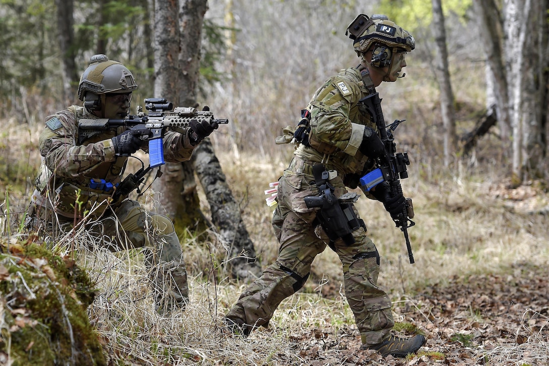 Pararescuemen approach an enemy position during mass casualty search and rescue training at Joint Base Elmendorf-Richardson, Alaska, May 4, 2016. Air Force photo by Alejandro Pena 