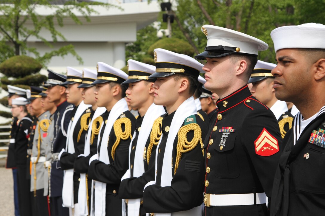 Pallbearers prepare to honor fallen Soldiers from the Korean War during the repatriation ceremony on the Knight Field, in Seoul, South Korea, April 28. 