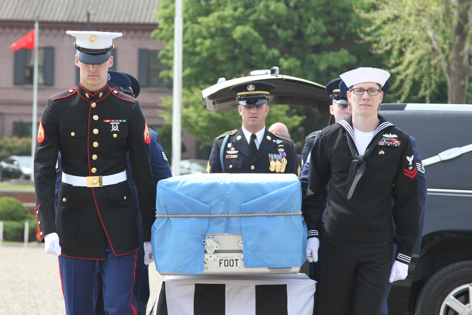 Pallbearers hold the caskets of the fallen Soldiers during a repatriation ceremony on the Knight Field, in Seoul, South Korea, April 28. The ceremony was conducted to return remains of United Nations Command and Korean Soldiers who died on the field of battle during the Korean War. 