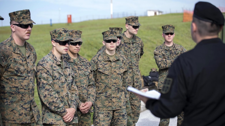 Warrant Officer Branislav Banovacki, a counter terrorism military police technician with Special Brigade, Serbian Armed Forces, shows Marines how to conduct a search for improvised explosive devices in a car during exercise Platinum Wolf 2016 at Peacekeeping Training Operations Center South Base in Bujanovac, Serbia, May 10, 2016. Reserve Marines with 4th Law Enforcement Battalion, Force Headquarters Group, Marine Forces Reserve join six other partner nations to conduct classes on peacekeeping operations and non-lethal weapons systems. 