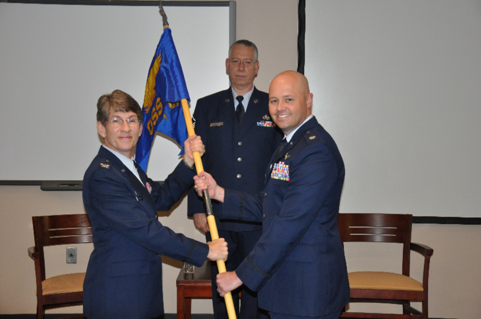 Members of the 315th Operations Support Squadron welcomed a new commander during a change of command ceremony May 15, 2016 at Joint Base Charleston.  Lt. Col. Ronald Schier assumed command from Lt. Col. Lara Morrison at the ceremony. (U.S. Air Force photo by Maj. Wayne Capps)