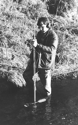 Mark Nelson takes stream measurements in Little Salt Creek (Lincoln, Neb) using a standard AA stream gauge meter while working for the State of Nebraska in 1980.