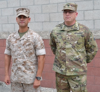 Capt. Albert Perez, 3rd Air Naval Gunfire Liaison Company officer in-charge, and Staff Sgt. William Noel, 729th Transportation Company non-commissioned officer in-charge, worked in a joint operations task at the U.S. Army Reserve Center, Bell, Calif., May 6, loading wheeled vehicles and equipment for Operation Maple Resolve, which is being conducted at Canadian Forces Base Wainwright, east of Edmonton, Canada. Operation Maple Resolve is the Canadian Forces largest training exercise of the year.