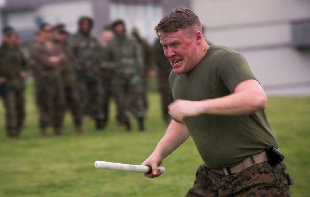 Cpl. Joseph A. Myers, a military policeman with 4th Law Enforcement Battalion, Force Headquarters Group, Marine Forces Reserve, participates in the oleoresin capsicum qualification course during exercise Platinum Wolf 16 at Peacekeeping Operations Training Center South Base, Serbia, May 11, 2016. Exercise Platinum Wolf 16 is designed to seamlessly integrate Reserve Marines with the active component while demonstrating interoperability with partner nations in the region. (U.S. Marine Corps photo by Lance Cpl. Devan Alonzo Barnett)
