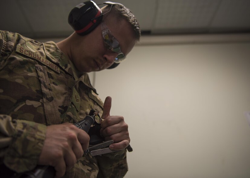 Senior Airman Addison Schumacher, 457th Expeditionary Fighter Squadron aircrew flight equipment technician, grinds away excess material for a face mask at Bagram Airfield, Afghanistan, May 15, 2016. Members of the 457th EFS/AFE ensure that Airmen have the supplies necessary for any situation, from packing emergency items like parachutes and survival kits to maintaining regularly used items like flight helmets and oxygen masks. (U.S. Air Force photo by Senior Airman Justyn M. Freeman)
