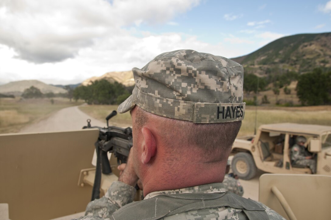 Fort Hunter-Liggett - U.S. Army Reserve Sgt. Jason Hayes a wheeled vehicle mechanic with the 351st MP Company, of Ocala, Florida, guard, for opposition forces at Entry Control Point for one of the Forward Operating Bases at Fort Hunter-Liggett, Calif. for training exercise Warrior Exercise 2016 on May 5. The 351st MP Co. is conducting 24 hour operations of the Entry Control Point for the entire duration of WAREX. (U.S. Army photo by Sgt. Marco Gutierrez)