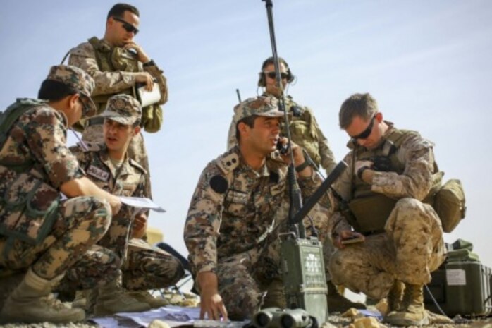 Members of the Jordanian Armed Forces work alongside U.S. Marines with 3rd Air Naval Gunfire Liaison Company, Special Purpose Marine Air Ground Task Force 16.2, to direct air support during Exercise Eager Lion 16 at Armor Range, Quick Reaction Force, Kingdom of Jordan on May 16, 2016. Eager Lion 16 is a US military bi-lateral exercise with the Hashemite Kingdom of Jordan designed to strengthen relationships and interoperability between partner nations while conducting contingency operations. (U.S. Marine Corps photo by Cpl. Lauren Falk 5th MEB COMCAM/Released)