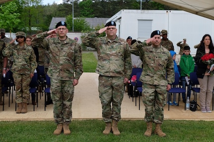 KAISERSLAUTERN, Germany-U.S. Army Reserve Soldiers from the 7th Mission Support Command and the 7th MSC’s 446th Transportation Battalion (Movement Control) conducted a change of command ceremony May 14, 2016.
Lt. Col. Robert Keck, the new 446th Transportation Battalion (MC) commander, right, received command from Lt. Col. (P) Aaron J. Justice, the outgoing commander as Col. Kevin M. Sanders, center, the deputy commander of the 7th MSC, officiated the ceremony.