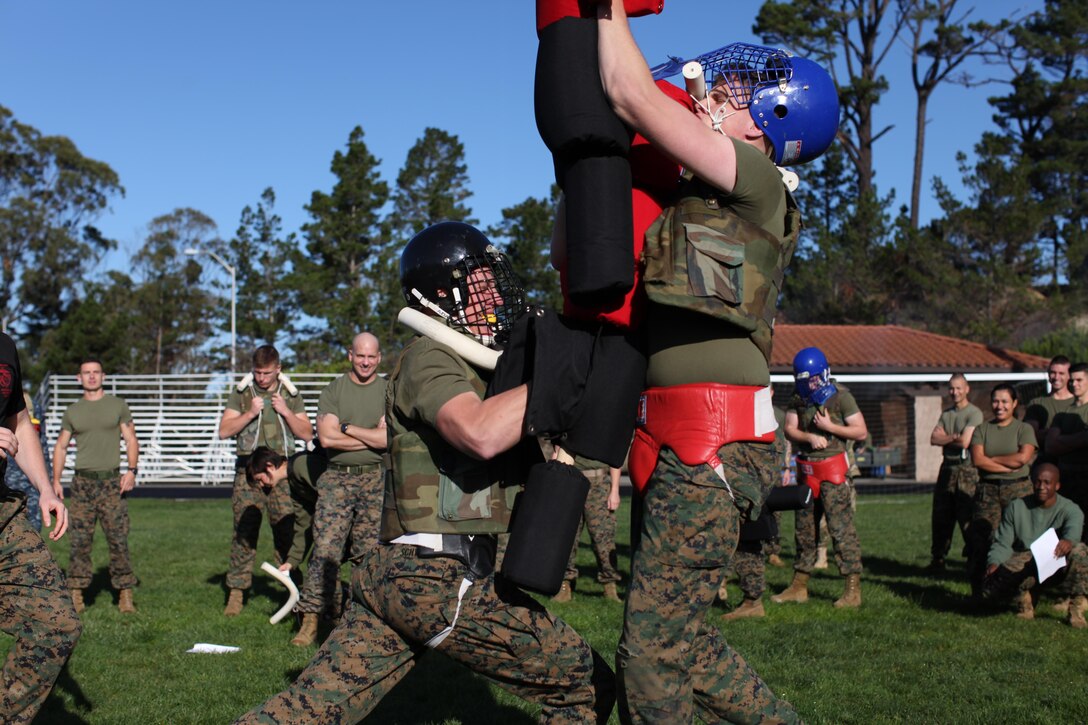 Marines from the Marine Corps Detachment test their martial skills during a pugil stick bout.  