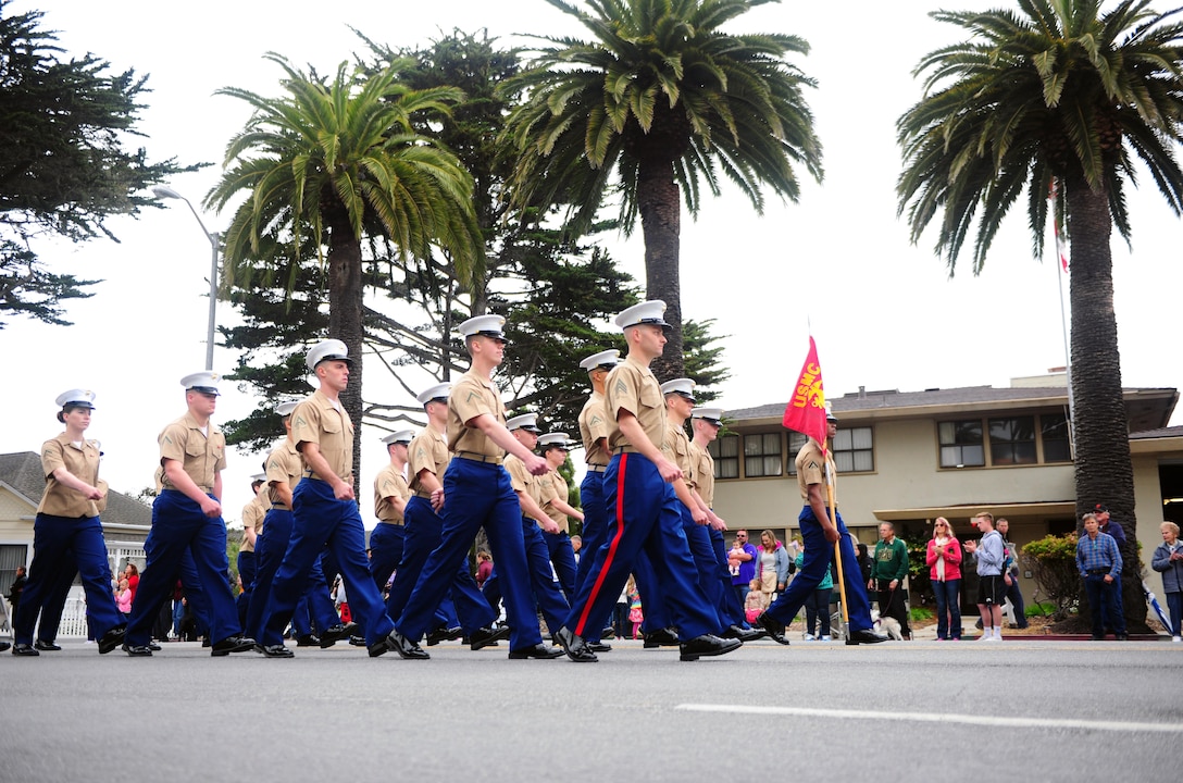 PRESIDIO OF MONTEREY, Calif. -- The joint service color guard and service marching units from Defense Language Institute Foreign Language Center led the parade that kicked off Pacific Grove's 59th Annual Good Old Days Festival in downtown Pacific Grove, April 9. Free meals were provided to active duty military at the Pacific Grove Chamber of Commerce tent. The two-day event is the largest arts and craft festival in the county and drew an estimated 35,000 - 45,000 people to "America's Last Hometown."  -Steven L. Shepard, Presidio of Monterey Public Affairs.