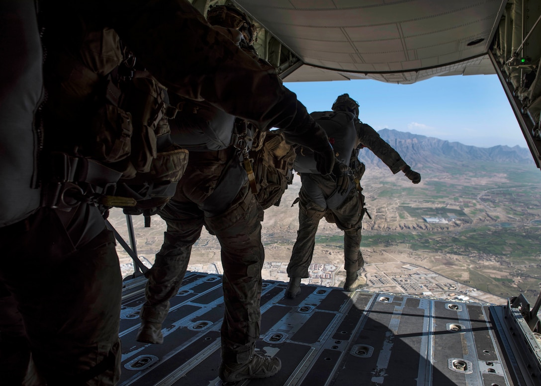 Pararescuemen jump from a C-130J Super Hercules aircraft during a mission rehearsal at Bagram Airfield, Afghanistan, April 28, 2016. Air Force photo by Senior Airman Justyn M. Freeman