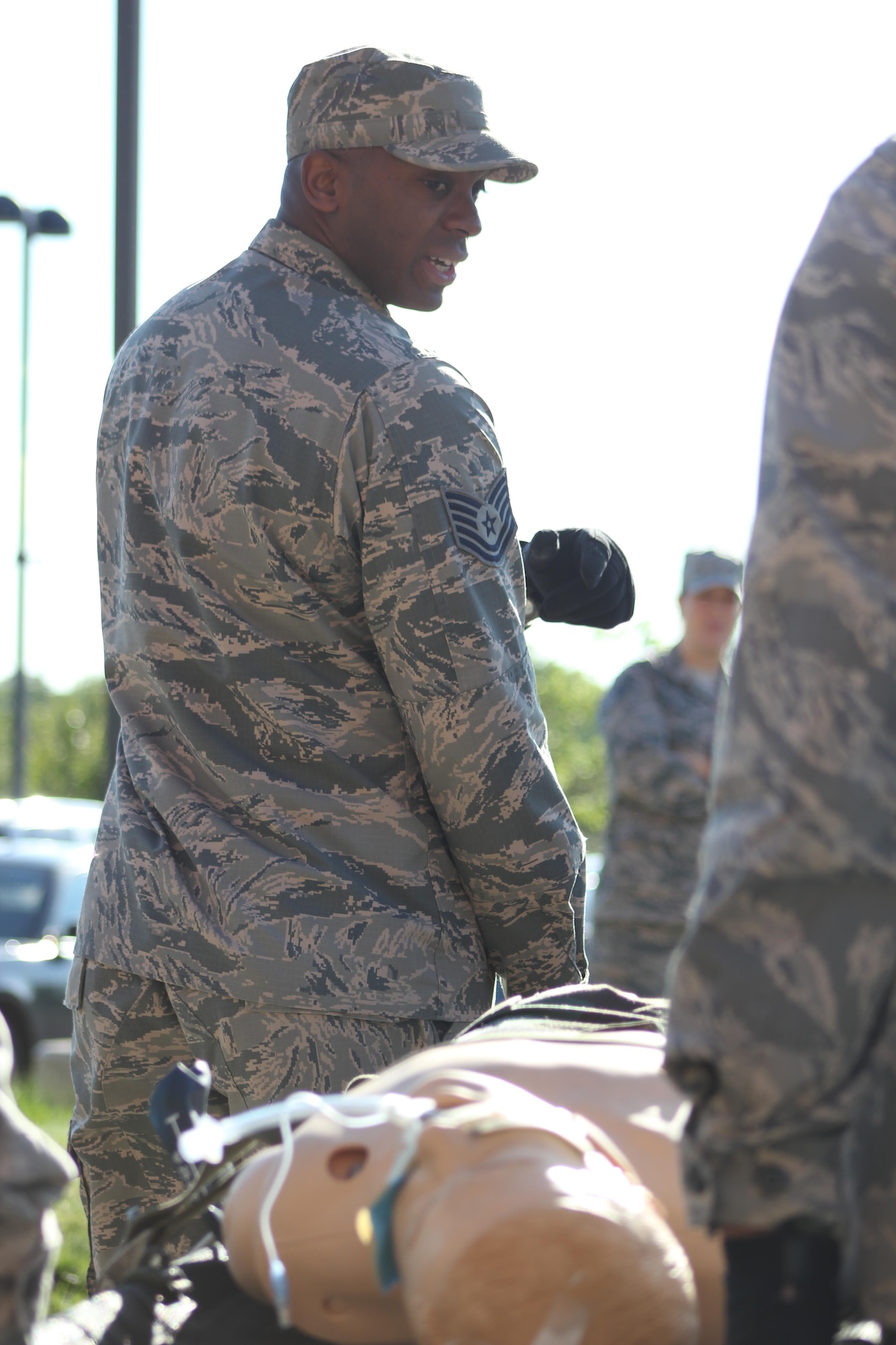 Technical Sgt. Larry Minor, 459th Aeromedical Staging Squadron aerospace medical technician, conducts litter carry training at Joint Base Andrews, Md., May 15, 2016.  The training was part of a two-hour exercise to practice the en route patient staging system.  (U.S. Air Force photo by/Tech. Sgt. Brent A. Skeen)