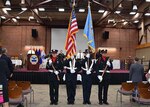 The honor guard comprising Defense Logistics Agency Installation Support at Richmond firefighters and police officers moves to retire the colors at the conclusion of the Peace Officers' Memorial Day observation at the Lotts Conference Center on Defense Supply Center Richmond, Virginia, May 12, 2016. 