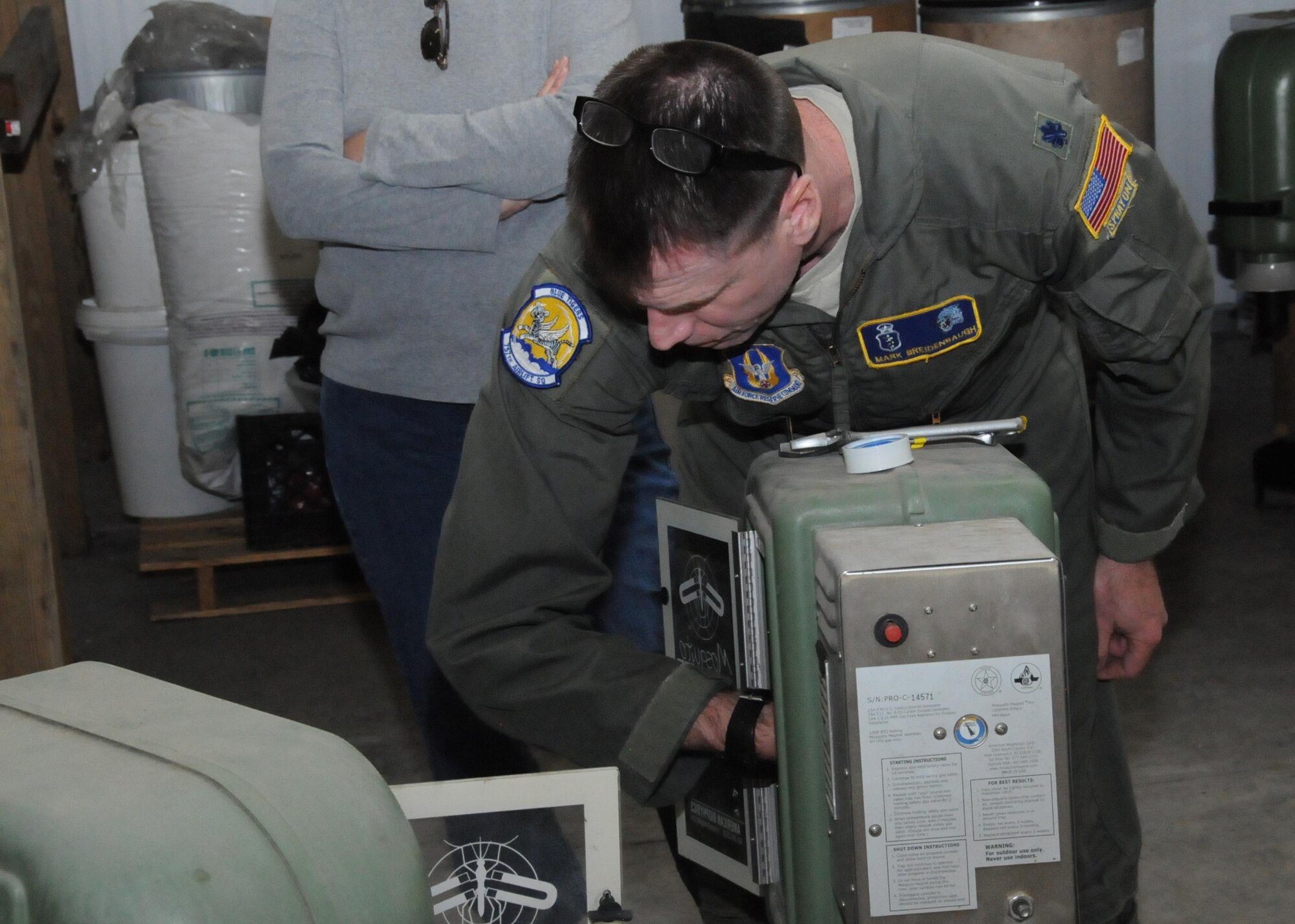 Lt. Col. Mark Breidenbaugh, an entomologist assigned to the 757th Airlift Squadron out of Youngstown, Ohio, inspects mosquito magnet units which will be used in an upcoming aerial spray mission, here April 6, 2016. The aerial spray unit comes here on a yearly basis to help reduce the mosquito and noseeum (small biting gnats) populations. Past studies have shown the spraying to reduce the mosquito and noseeum population by more than 80 percent. (U.S. Air Force photo/Tech. Sgt. Rick Lisum)
