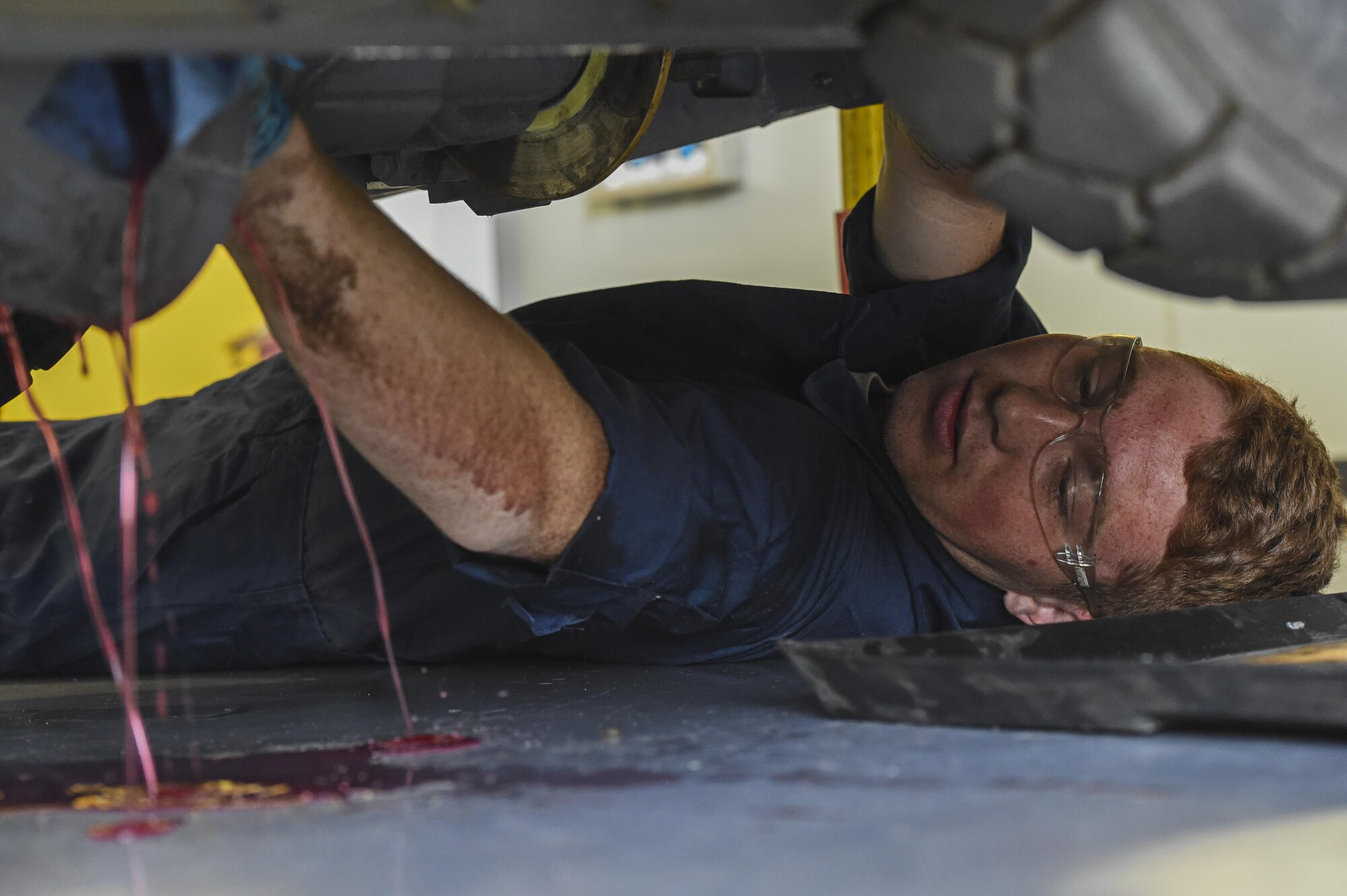 Senior Airman Tylor, 432nd Maintenance Squadron aerospace ground equipment journeyman, checks hydraulics on a bomb lift May 11, 2016, at Creech Air Force Base, Nevada. On August 31, 1949, Secretary of Defense Louis Johnson announced the creation of an Armed Forces Day to replace separate Army, Navy, Marine Corps and Air Force observances.  (U.S. Air Force photo by Senior Airman Adarius Petty/Released)