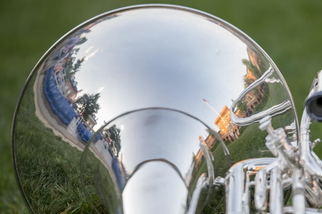 A reflection of the Barracks on a cornet prior to the Evening Parade at Marine Barracks Washington, D.C., May 13, 2016. The guest of honor for the parade was the Honorable Frank Kendall, the Under Secretary of Defense for Acquisition, Technology and Logistics, and the hosting official was Gen. John M. Paxton Jr., assistant commandant of the Marine Corps. (Official Marine Corps photo by Cpl. Chi Nguyen/Released)