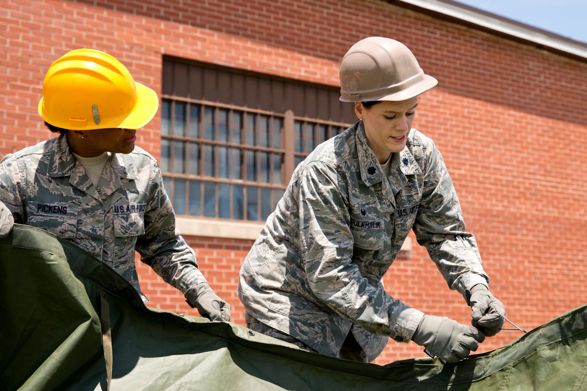 U.S. Air Force Reserve Airmen assigned to the 913th Force Support Squadron, participate in tent-building training during the 913th Airlift Group’s Unit Training Assembly weekend at Little Rock AFB, Ark., May 15, 2016. The hands-on training, which is required every 20 months, gives the Airmen experience with the equipment in the event they are deployed to a location with little or no support. (U.S. Air Force photo by Master Sgt. Jeff Walston/Released)    