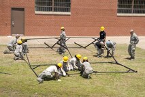 U.S. Air Force Reserve Airmen assigned to the 913th Force Support Squadron, participate in tent-building training during the 913th Airlift Group’s Unit Training Assembly weekend at Little Rock AFB, Ark., May 15, 2016. The hands-on training, which is required every 20 months, gives the Airmen experience with the equipment in the event they are deployed to a location with little or no support. (U.S. Air Force photo by Master Sgt. Jeff Walston/Released)    