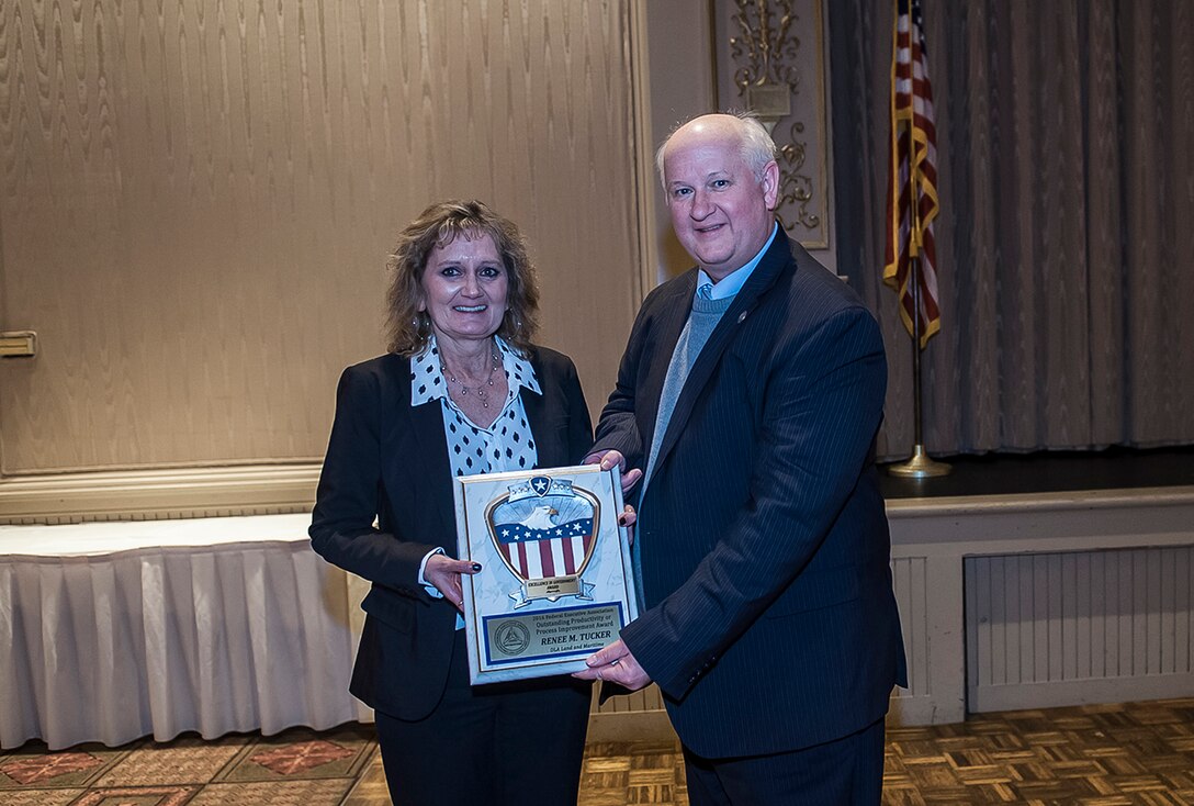 At the 39th Annual Federal Executive Association’s Excellence in Government Awards luncheon, Renee M. Tucker, a purchasing agent with Maritime Supplier Operations, claimed the Productivity or Process Improvement Award for an individual from a large agency. She is pictured with Thomas Leach, director, HUD Columbus Field Office. 