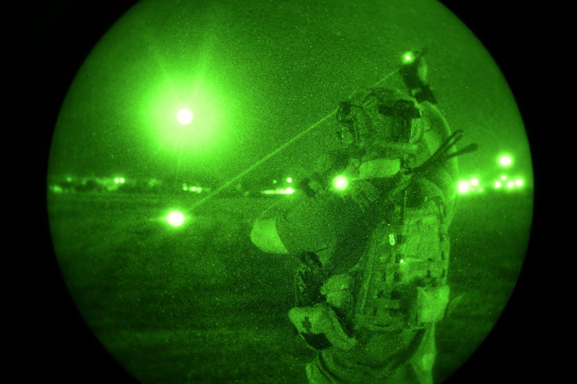 A U.S. Army Soldier directs a UH-60 Black Hawk during Exercise Emerald Warrior 16 at Naval Station Pascagoula, Miss., May 10, 2016. Emerald Warrior is a U.S. Special Operations Command sponsored mission rehearsal exercise during which joint special operations forces train to respond to real and emerging worldwide threats. (U.S. Air Force photo by Senior Airman Logan Carlson)