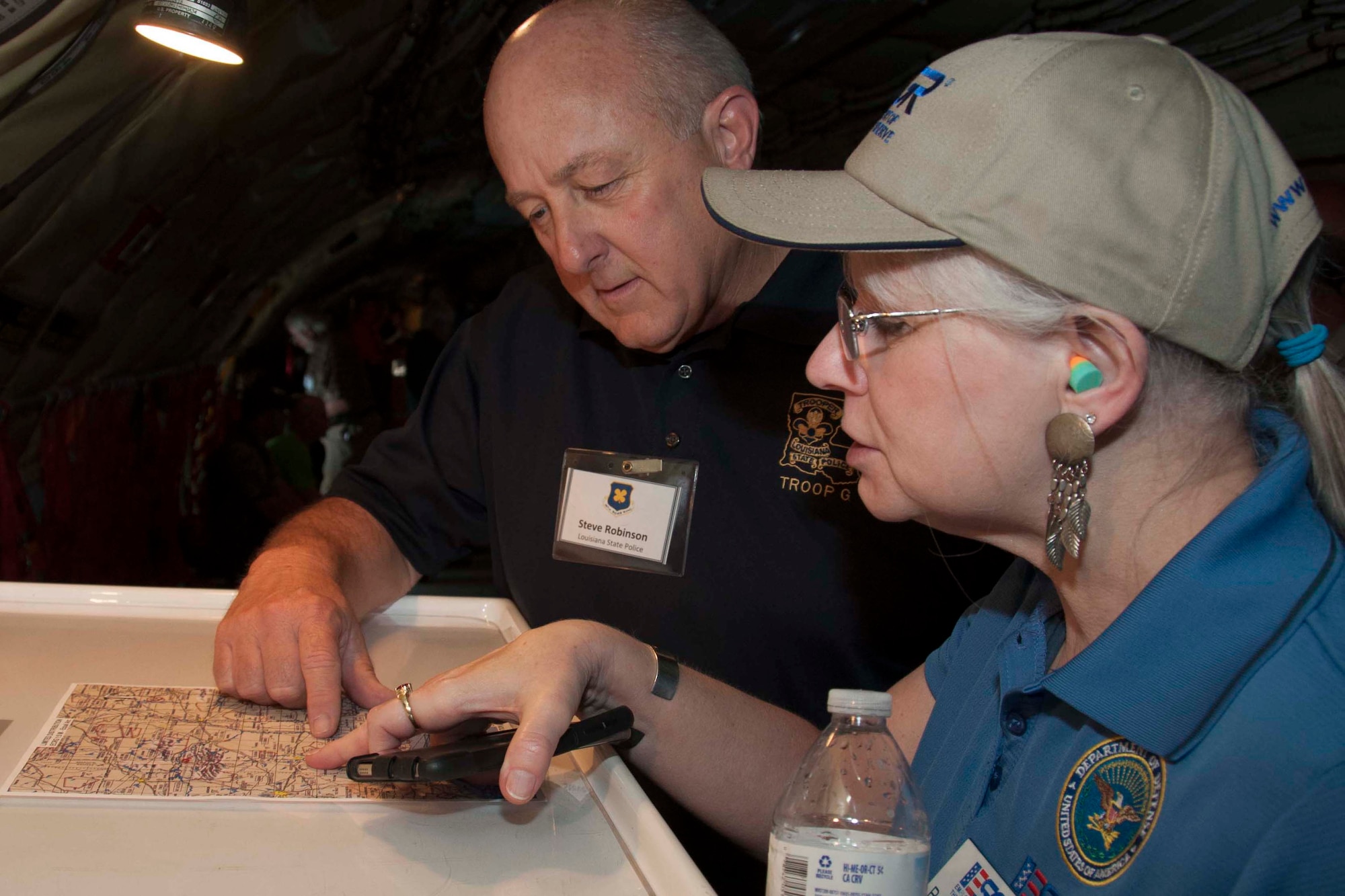 Steve Robinson and Ruth Medcalf review the flight map of the KC-135 Stratotanker during a refueling flight for the 307th Bomb Wing’s Employer Appreciation Day, Barksdale Air Force Base, La., May 14, 2016.  This event allows 307th BW members to nominate their employers to take part in a flight and other events that build a greater understanding of the demands faced by Reservists, as well as gives the wing an opportunity to thank civilian employers for being flexible in working with the reservists.   (U.S. Air Force photo by Tech. Sgt. Ted Daigle/released)