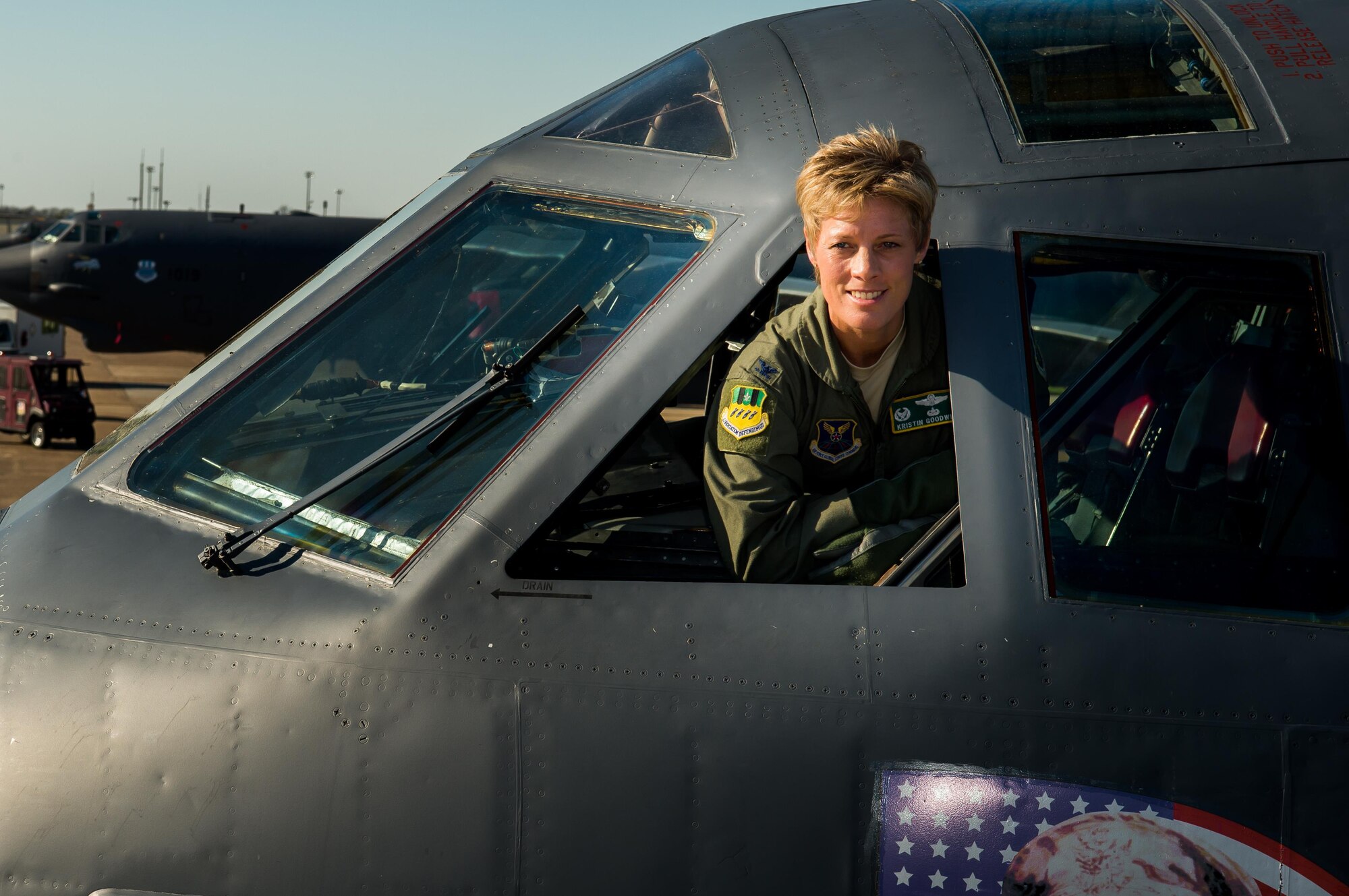 Col. Kristin E. Goodwin, 2nd Bomb Wing commander, peers from the cockpit of a B-52H Stratofortress on Barksdale Air Force Base, La., May 21. Goodwin is scheduled to relinquish command of the 2nd BW to Col. Ty Neuman at a change of command ceremony here, May 20. (U.S. Air Force photo/Senior Airman Mozer O. DaCunha)