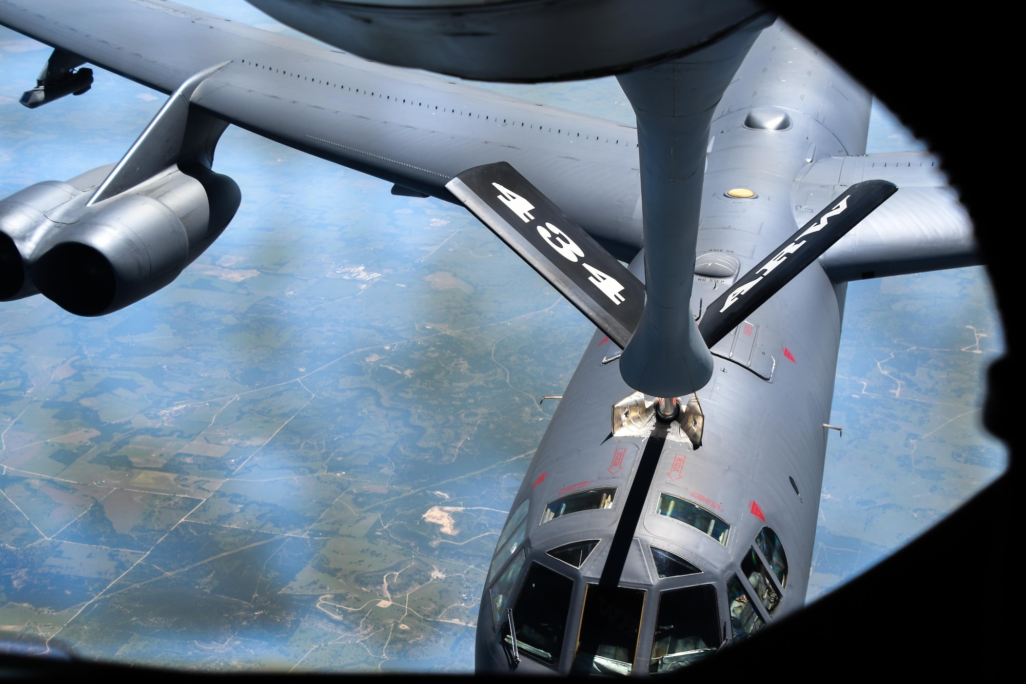 A KC-135 Stratotanker from the 434th Air Refueling Wing, Grissom Air Reserve Base, Ind., refuels a B-52 Stratofortress assigned to the 307th Bomb Wing during a flight out of Barksdale Air Force Base, La. on May 13, 2016. As part of the Wing’s Clergy Day. They also learned about the Reserve mission and saw a B-52 up close. (U.S. Air Force photo by Master Sgt. Dachelle Melville/Released)